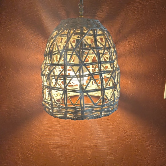 Boho netted rattan ceiling light.